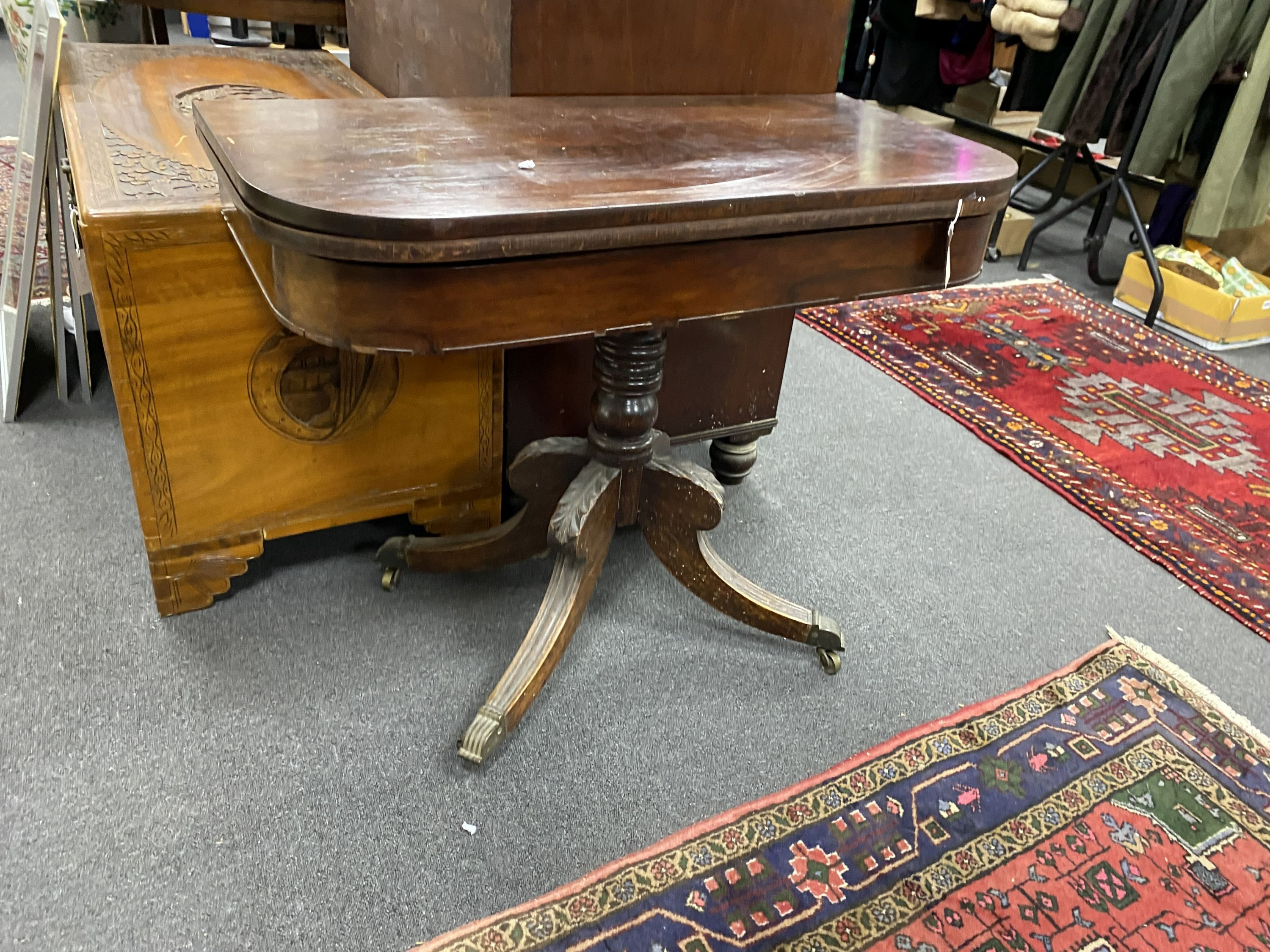 A Regency rosewood D shaped folding tea table, width 91cm, depth 45cm, height 72cm